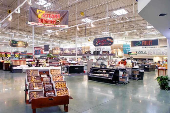 503073682 featured image Supermarket interior with various food sections and displays.