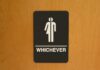 Unisex bathroom sign with Whichever text.