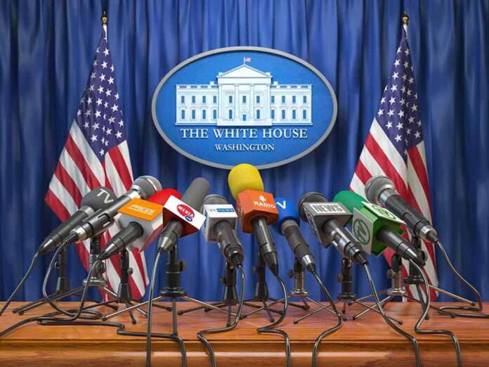 1186435138 featured image Multiple microphones at White House press briefing podium