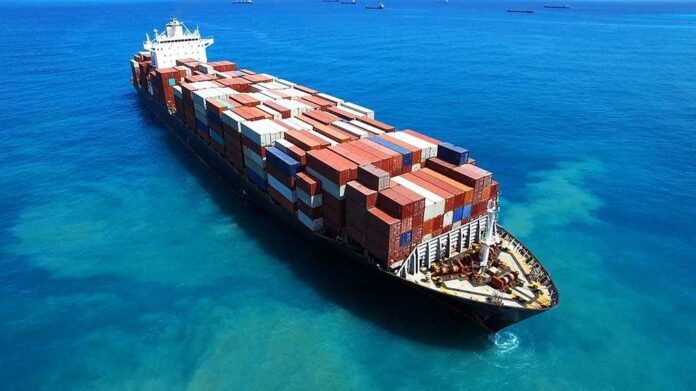 432945115 featured image Cargo ship loaded with containers in blue ocean.