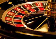 Close-up of roulette wheel with spinning ball