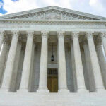 Supreme Court Has Ruled: Parents Gain NEW Power Building with columns under a cloudy sky