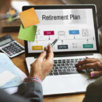 Shocking Layoffs Hit Seniors—Retirement Now a MIRAGE People discussing retirement plan on laptop screen