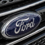 Ford logo on car grille close-up