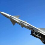 ISIS Kingpin Wiped Out—Trump’s Bold Move A military missile pointed upwards against a clear blue sky