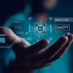 How North Korea and China Use AI to Infiltrate U.S. Businesses Hand holding digital AI and ChatGPT graphics.