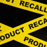 MORE Radioactive Shrimp Scares Hit Shelves Yellow tape with product recall text on black background