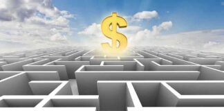 A man in a suit standing at the entrance of a maze with a dollar sign above
