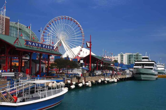 Navy Pier in Chicago with a ferris wheel and boats along the waterfront