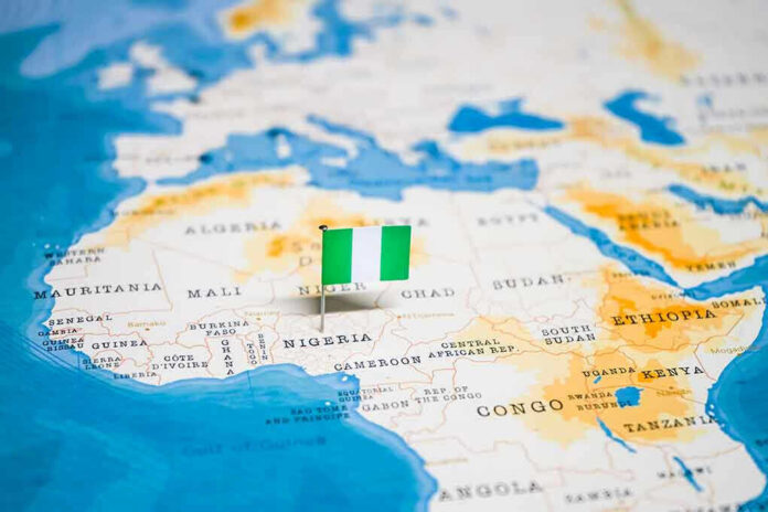 Flag pin marking Nigeria on Africa map