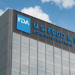 FDA building with blue logo and sky background