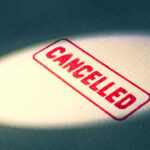 STAGGERING $30B Green Loan Slashed–Where THE MONEY Will GO Red Cancelled stamp under a spotlight.