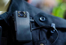 Body camera attached to a black uniform.