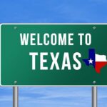 Texas GOP Civil War — Who Survives? Welcome to Texas road sign with a Texas map