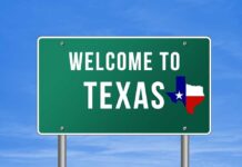Welcome to Texas road sign with a Texas map