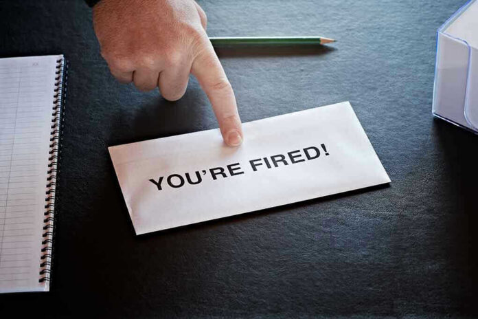 70617409 Envelope with YOURE FIRED and pointing finger.