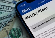 Mobile phone displaying IRS information about 401(k) plans on a background of cash