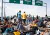 875 Dead Seeking Food In Gaza People sitting and resting on a highway.