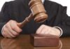 MURDER Convictions OVERTURNED – Jury Tampering SHOCK! A judge holding a gavel above a wooden block
