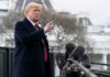 Donald Trump gesturing while speaking to the press outside