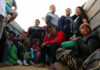 Ninth President Looms—Crisis Isn’t Done Group of people sitting in a truck.