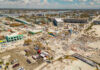 7.8 Earthquake Rocks Philippines — Buildings Down, Warnings Active Aerial view of hurricane-damaged buildings and debris.