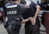 Police Release Shocking New Footage Police officer arrests handcuffed person.