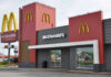 The McDonald’s Crash That Raised More Questions Than Answers McDonalds restaurant exterior with logo and drive-thru sign.
