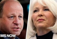 Colorado's Democratic governor under fire for commuting sentence of 2020 election denier