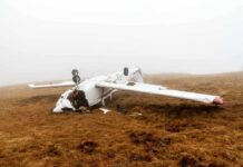 Missouri Crash Raises Chilling Questions Crashed airplane lying on its side in a foggy field