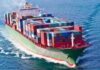 The Strait of Hormuz Drone Attack That Triggered U.S. Strikes on Iran A large cargo ship loaded with colorful containers sailing on the ocean
