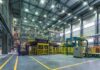 Interior view of a modern industrial facility with manufacturing equipment