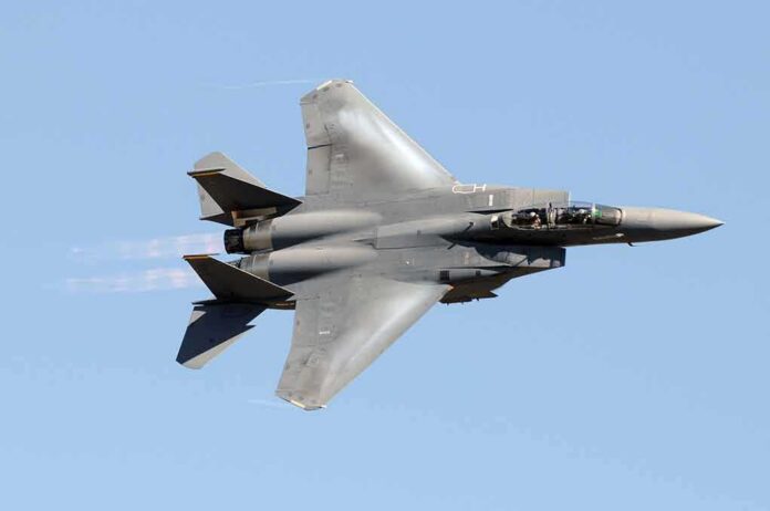 shutterstock_40446967 fighter jet banking in clear sky