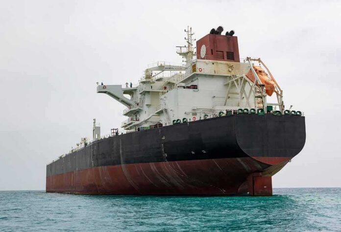 shutterstock_1985991914 Large oil tanker anchored in calm sea
