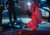 ChatGPT Clues In Double Homicide forensic investigator photographs crime scene evidence at night