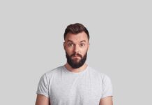 New York Magazine’s New Cover Is Hard to Miss Man with beard making surprised face against gray background