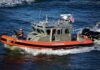 Air Patrol Nabs Overloaded Run Near Keys U.S. Coast Guard patrol boat speeding on open water