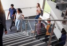 Students walking on a school staircase