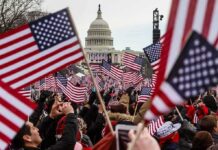 Mall Spectacle Stuns: Politics Or Patriotism? Crowd waving American flags near the U.S. Capitol