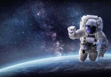 Astronaut floating above Earth against a starry galaxy backdrop