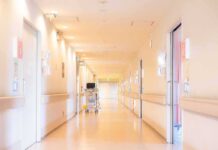 Chilling First: Child Euthanized, Panel Applauds Hospital corridor with doors and medical cart