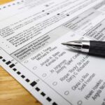 Primaries EXPOSE Deep State Control Ballot paper with pen on wooden surface