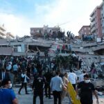 Pentagon Scrambles: School Bombing Blame Game Rescue workers and civilians on collapsed building after earthquake