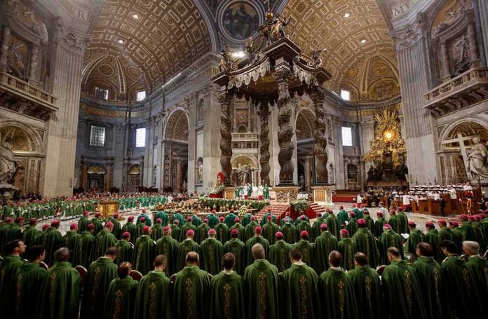 shutterstock_1864245124 Jonathan Cyprien among clergy during a mass in a grand cathedral interior