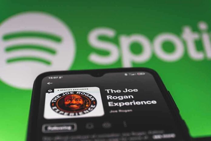Smartphone showing a podcast page on a music streaming app