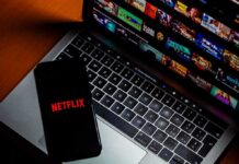 Netflix Is Fighting A Major Kids’ Privacy Case Smartphone with Netflix logo on a laptop keyboard