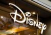 Disney store sign with illuminated script logo