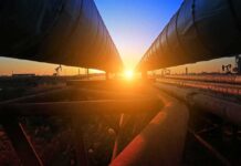 Drone Blitz Jolts Saudi Lifeline Industrial pipelines at sunset