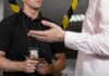 Staff Uprising Rattles Obama Presidential Center Police officer taking notes during a conversation