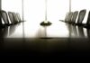 Florida Mayor Nabbed In COVID Grant Scandal empty conference room with long table and chairs